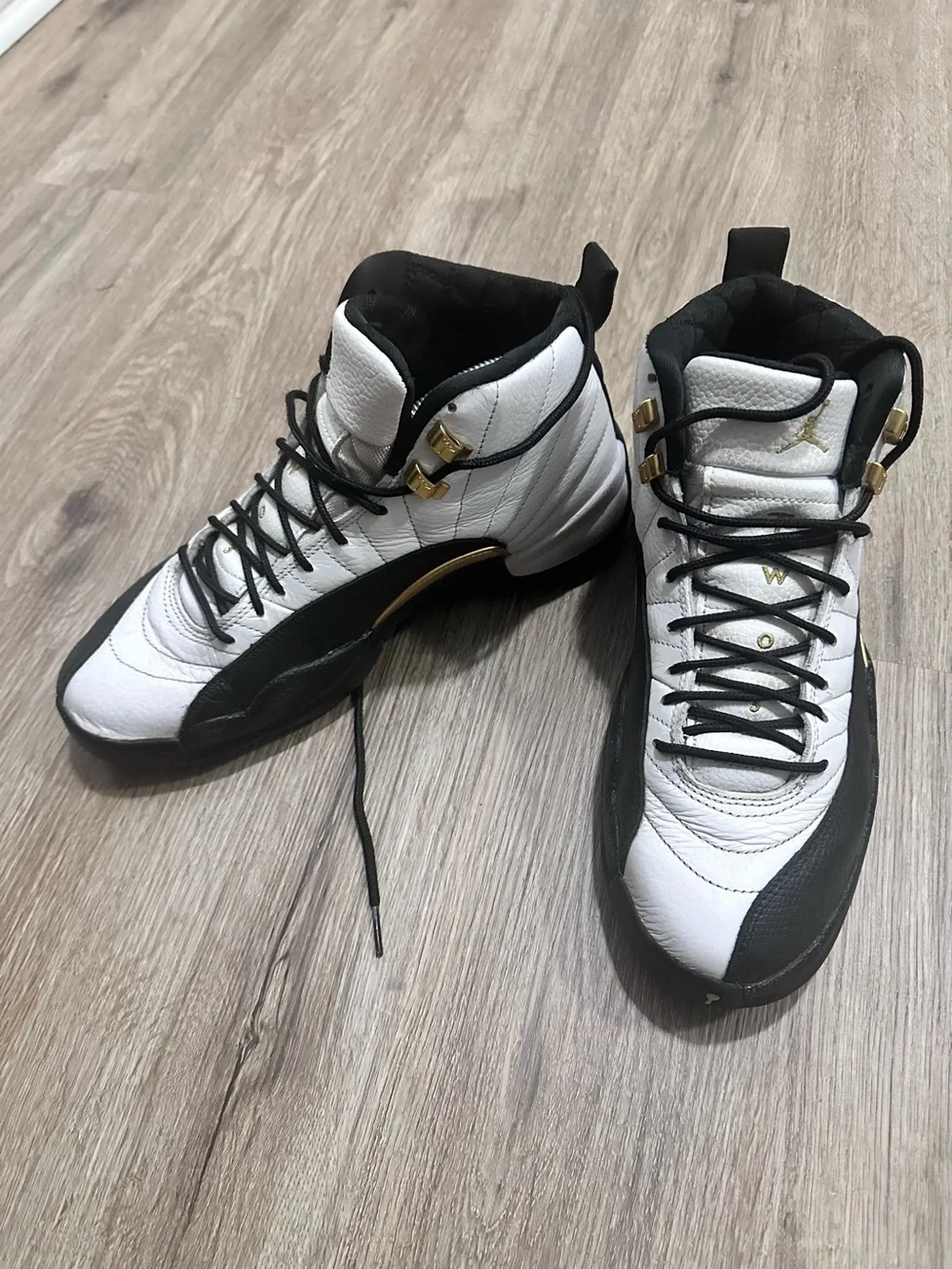 Jordan Men's White and Black High-Top Sneakers with Gold Accents